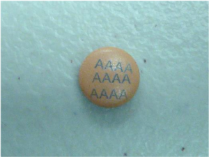 Laser marking on tablet