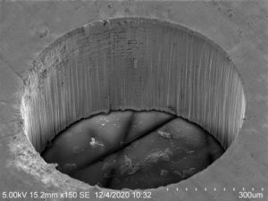 Laser hole drilling of stainless steel