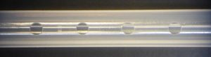 Femtosecond laser drilling of catheter