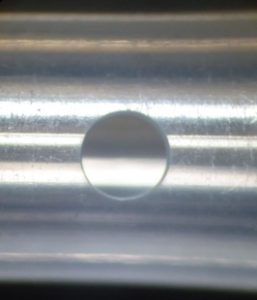 Laser hole drilling of catheter