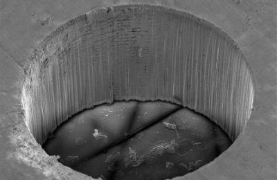 Picosecond laser drilling of aluminum